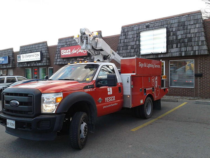 photo of a Yesco truck in a strip mall
