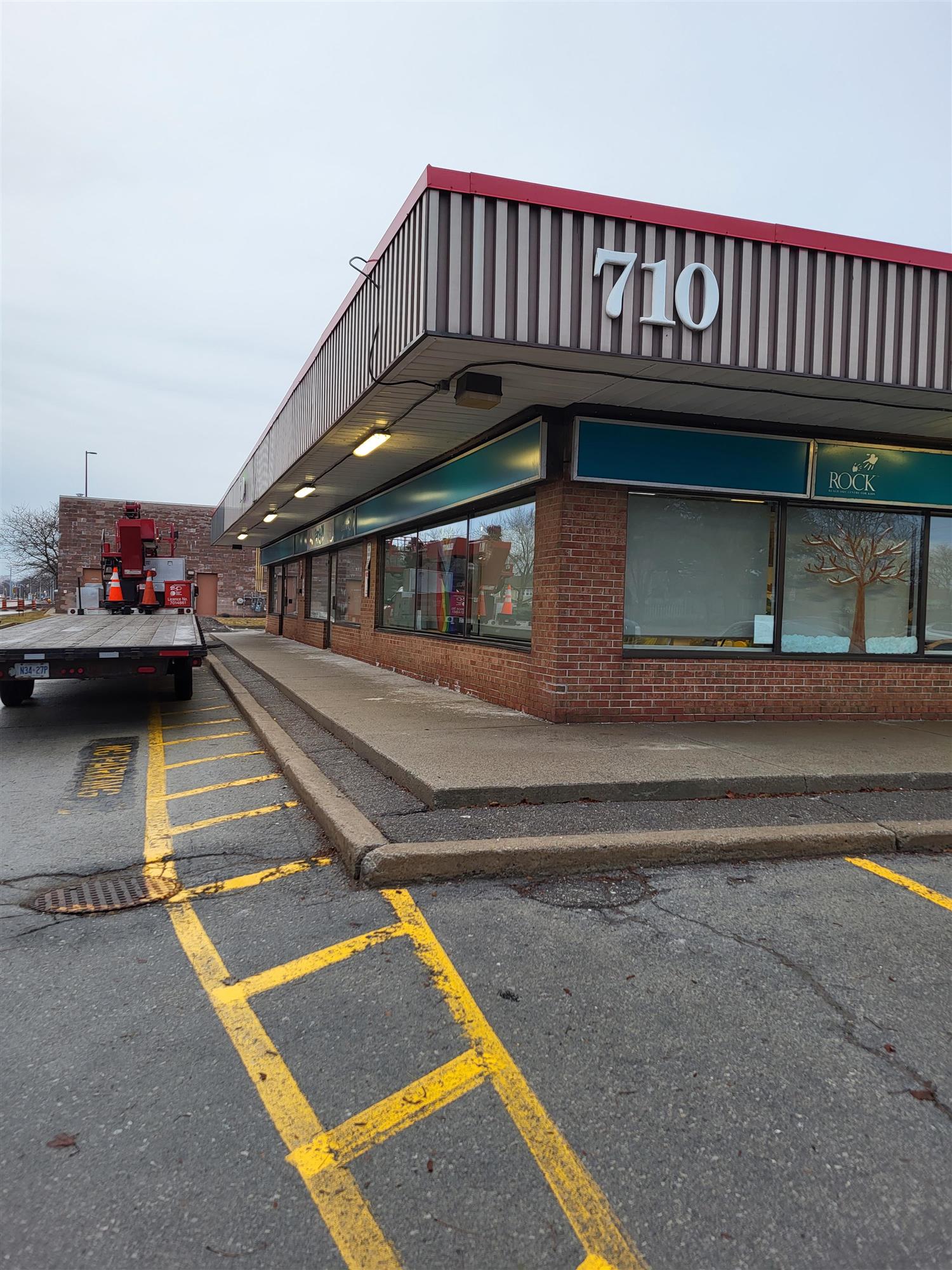 new sign installed on the side of the building at Early ON Child and Family Centre