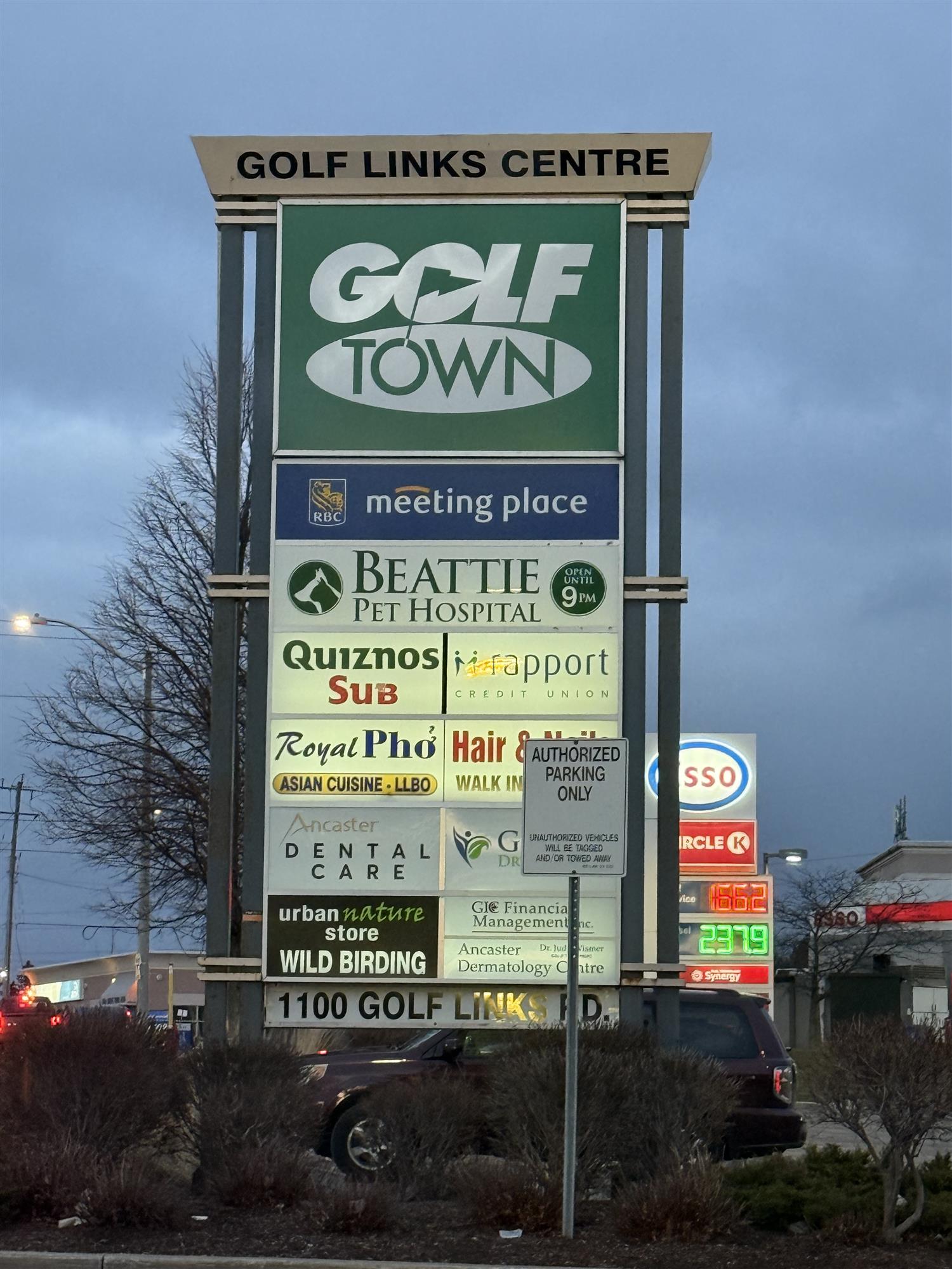 Large multi business pylon sign at Golf Links Centre
