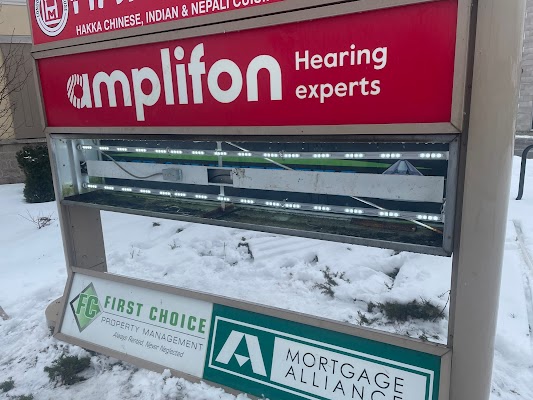 a multi business sign at Wharncliffe and Oxford Rd. London Ontario