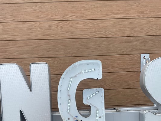 white lettering for Burger King sign being repaired