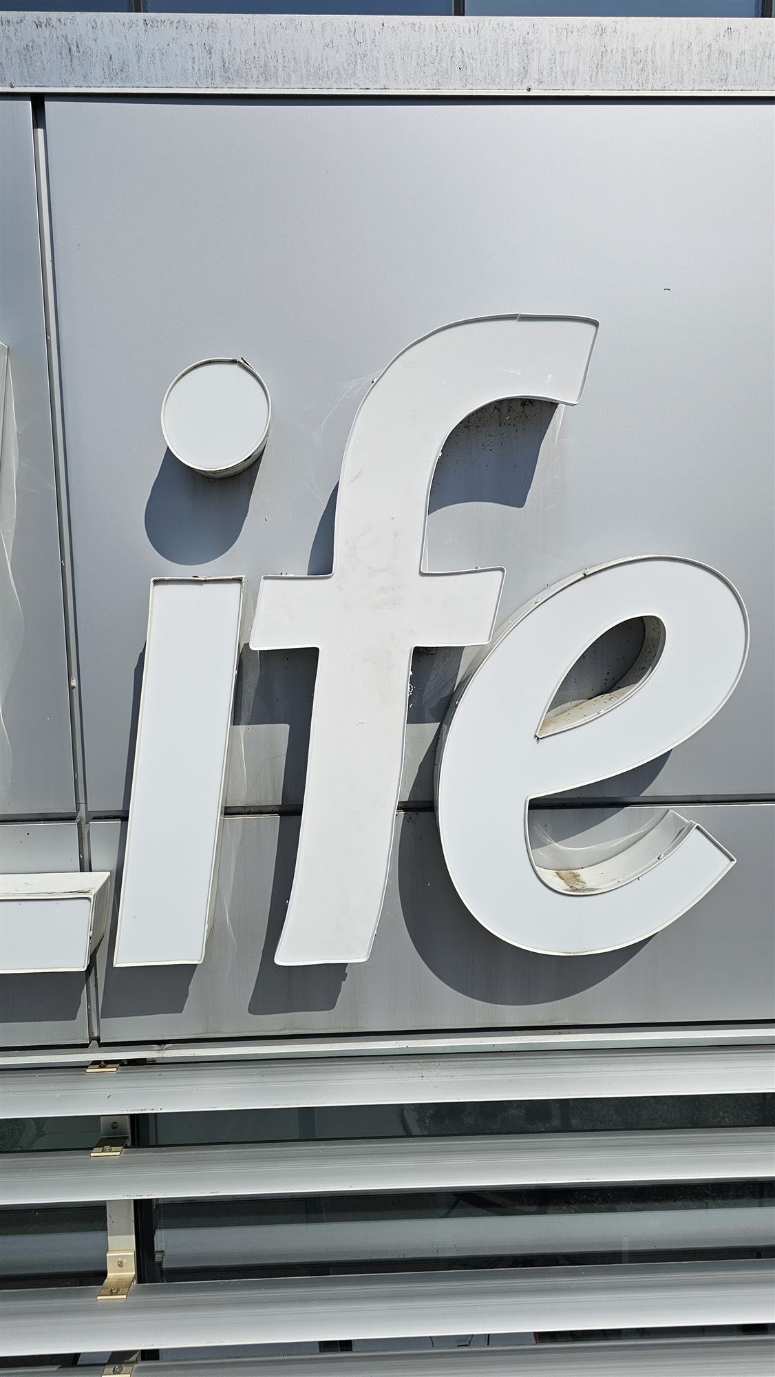 white sign letters IFE in good life sign