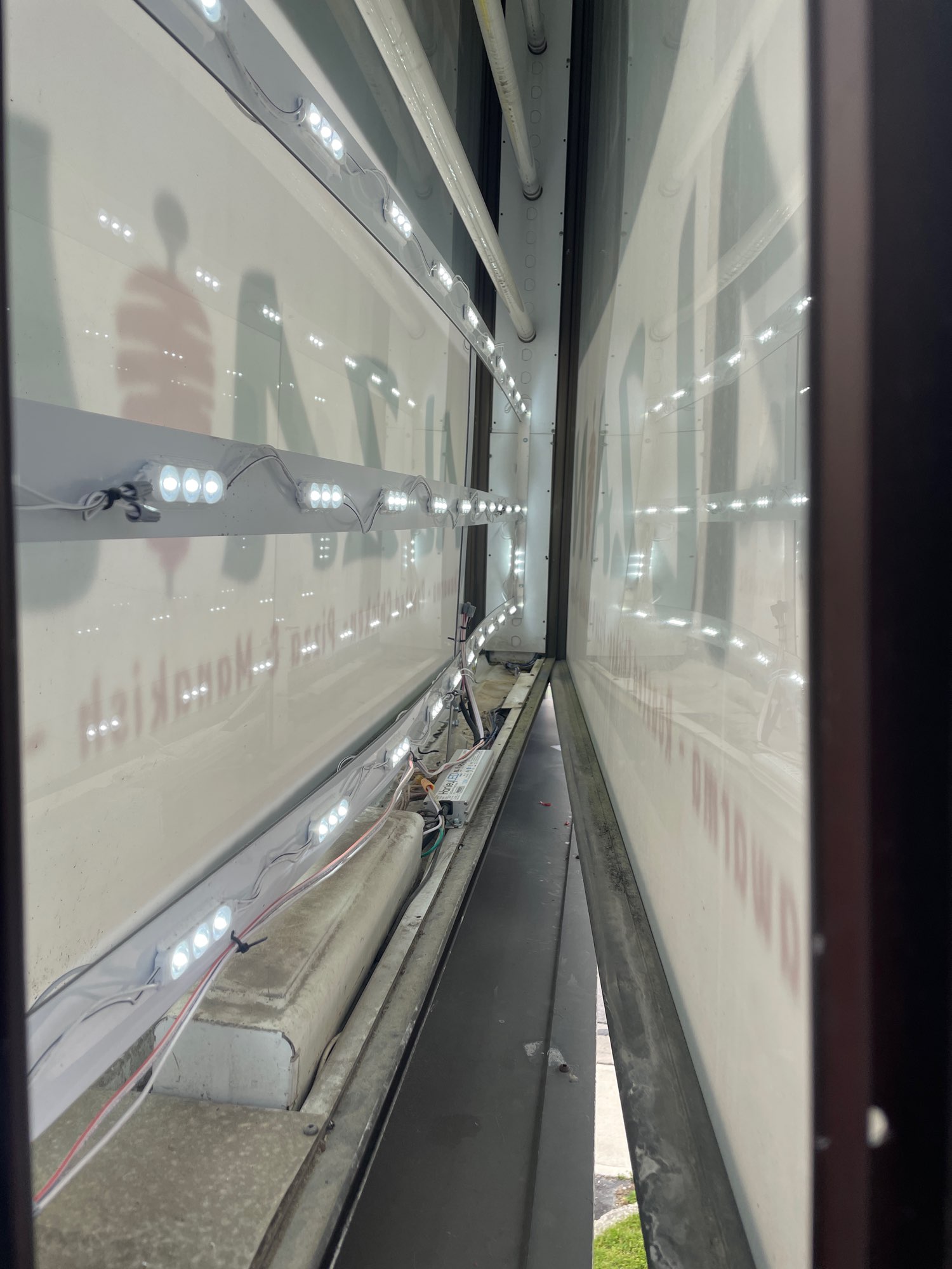 the inside view of a pylon sign showing the different types of lights it requires