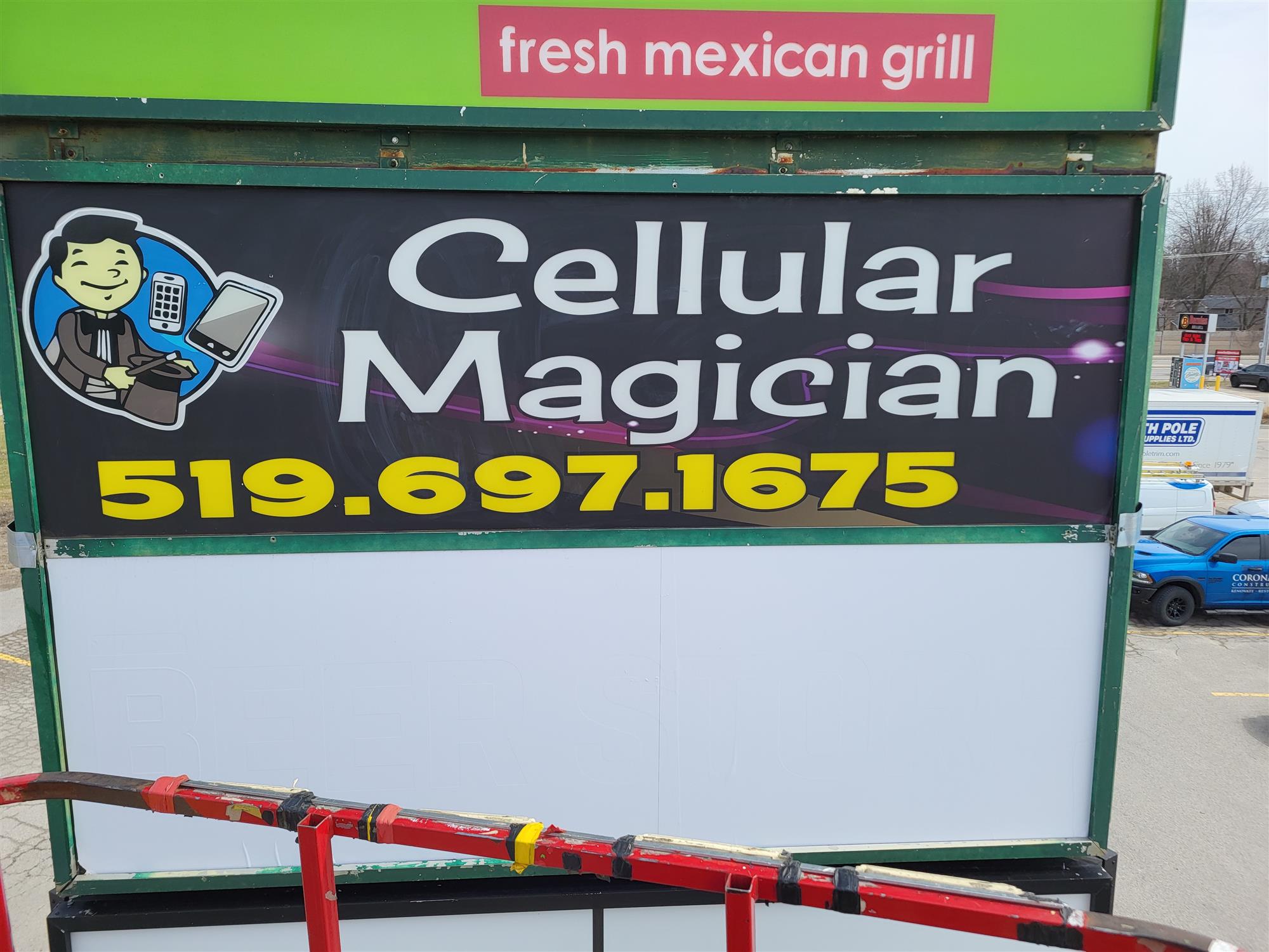 Cellular Magician sign with phone number 519-697-1675