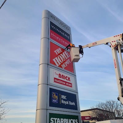 a large pylon sign at the Westwood centre for Winners, Homesense, Home Depot and the Brick