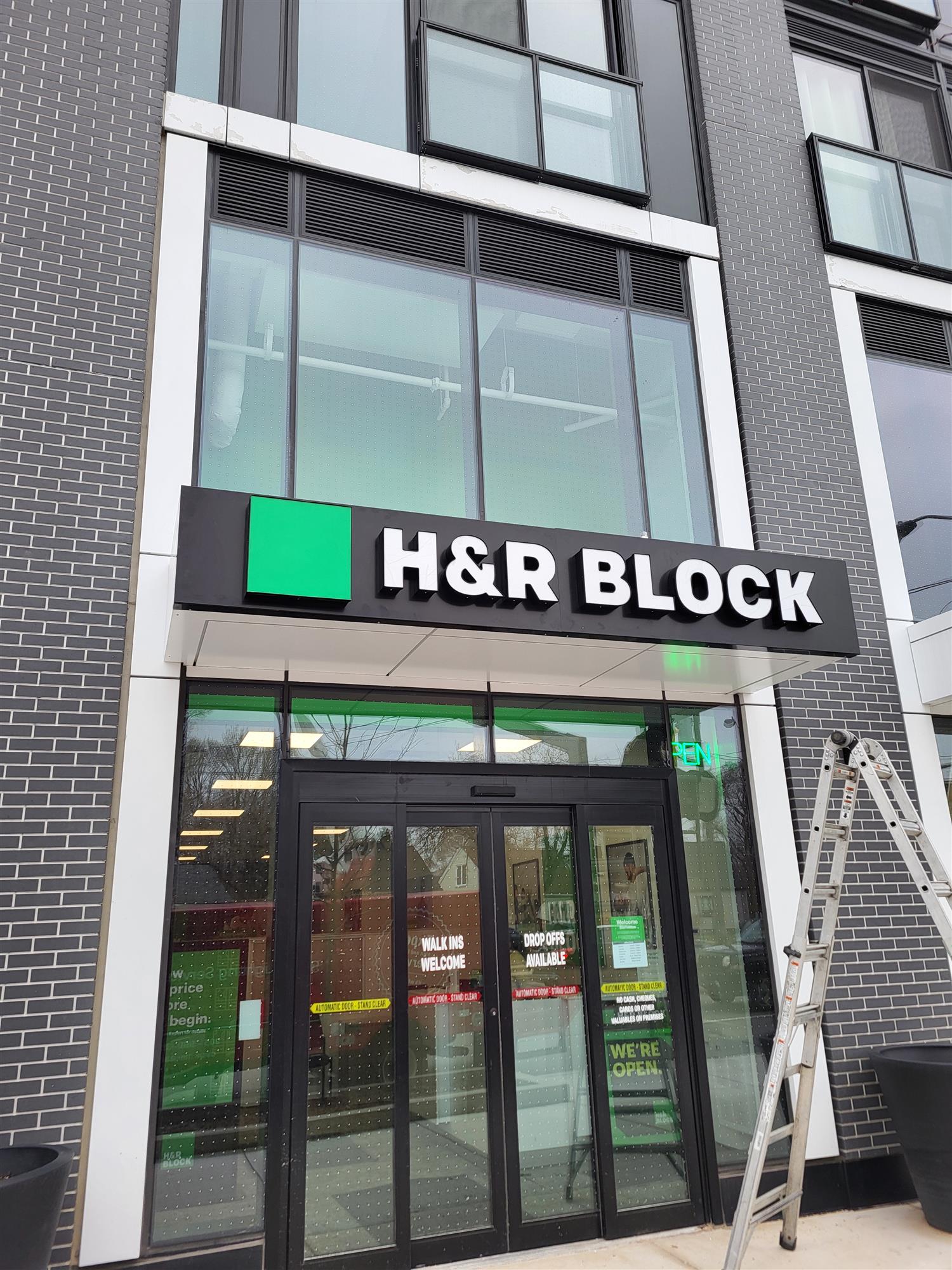 H and R Block sign over entrance of business