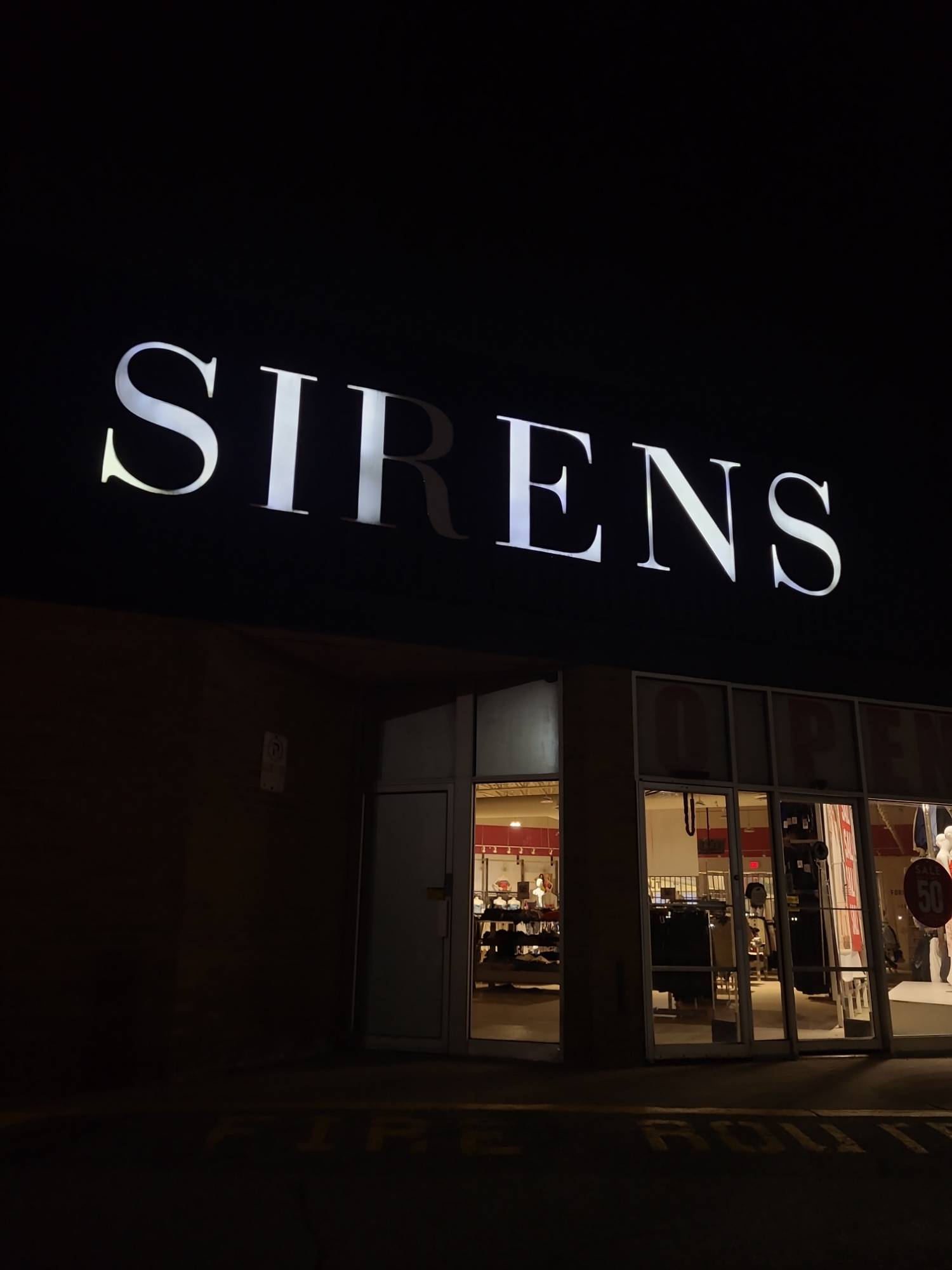 Sirens sign with the letter R burnt out